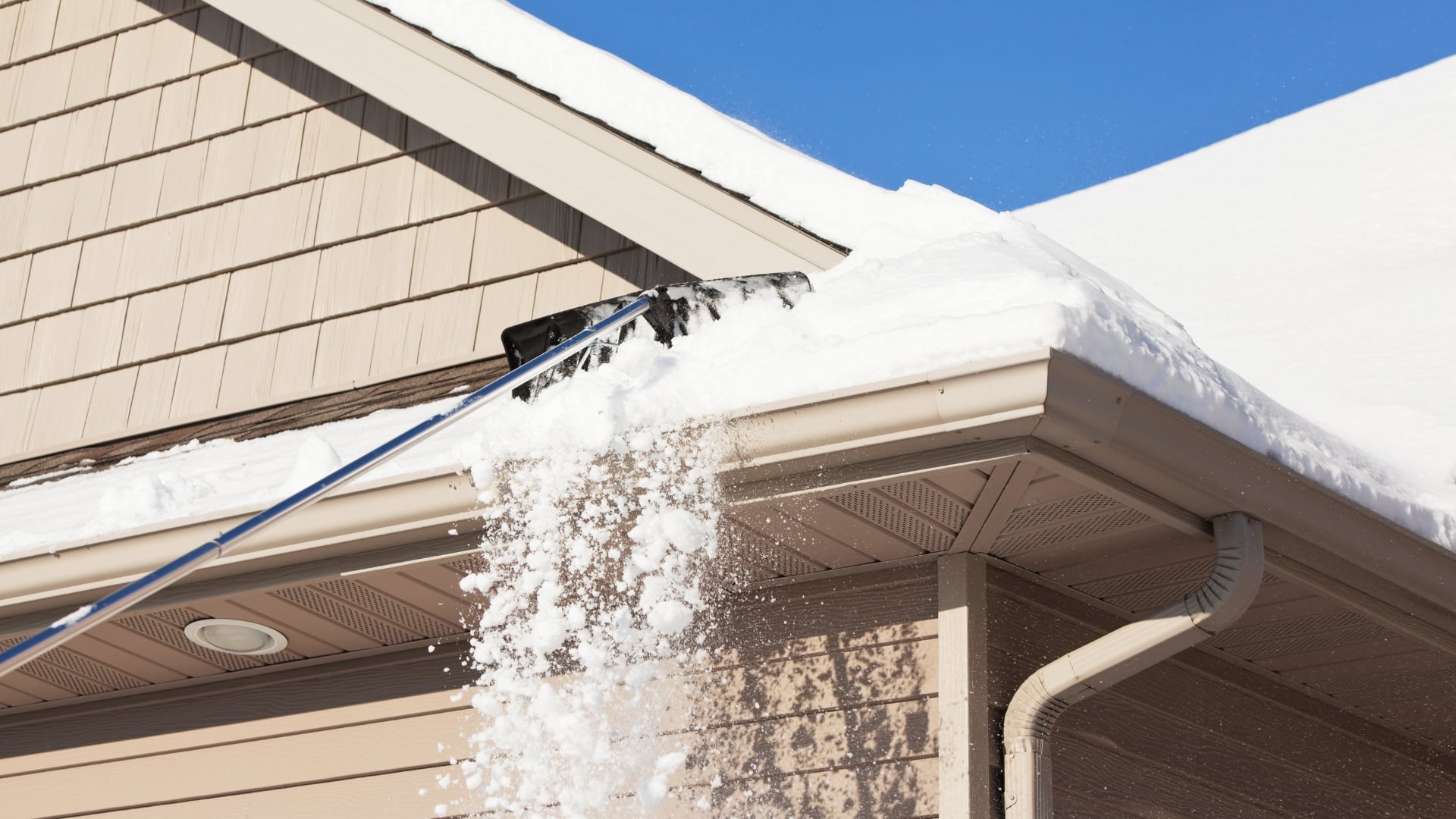 Roof with snow overload that need Winter Roof Inspection by Performance Roofing and Siding in Michigan