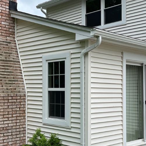 Exterior-View-with-Gutters-and-Siding