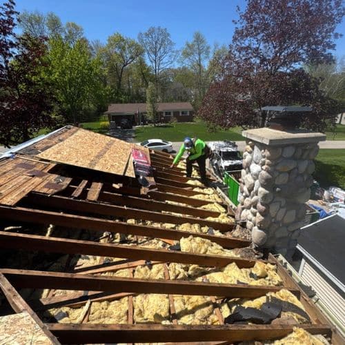 Storm damage roof replacement completed in Grand Rapids MI by Performance Roofing and Siding after insurance claim approval.